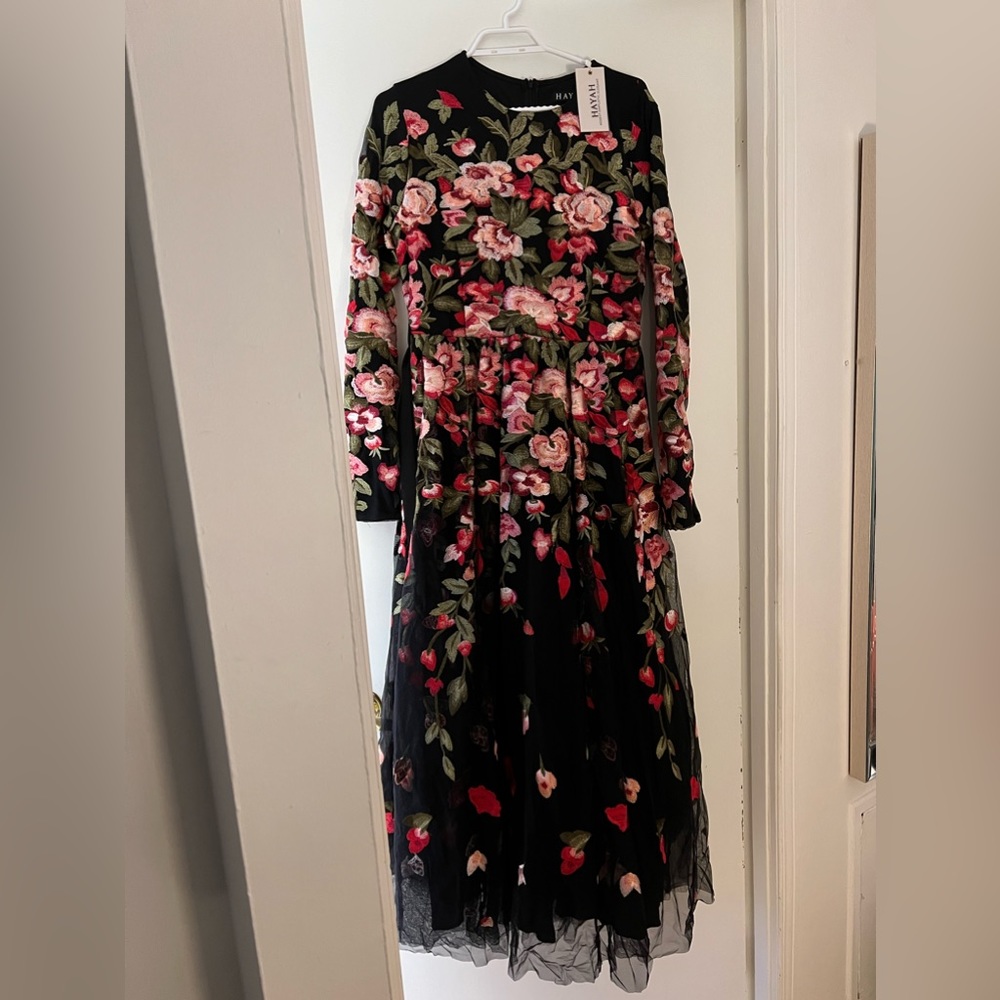 A beautiful never worn floral modest ball gown..